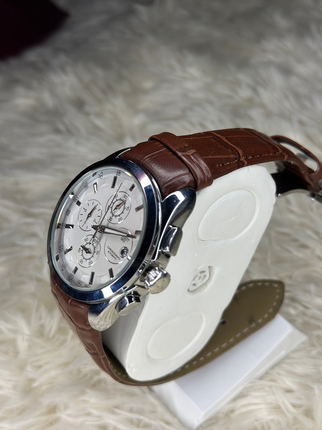 "Men’s Silver Chronograph Watch with Brown Leather Band"